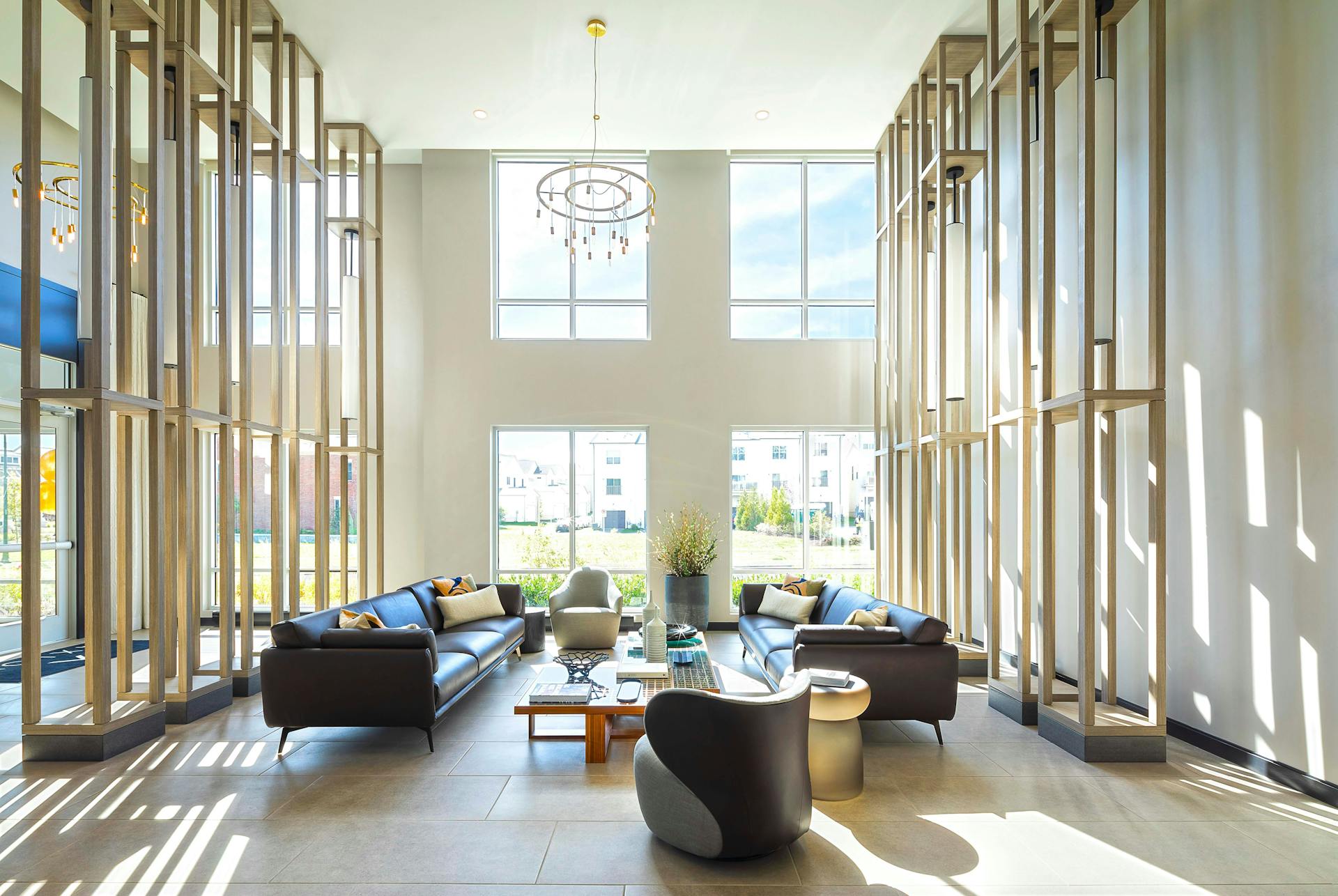 Lobby lounge with large windows and natural light